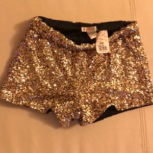 A’gaci gold sparkly shorts